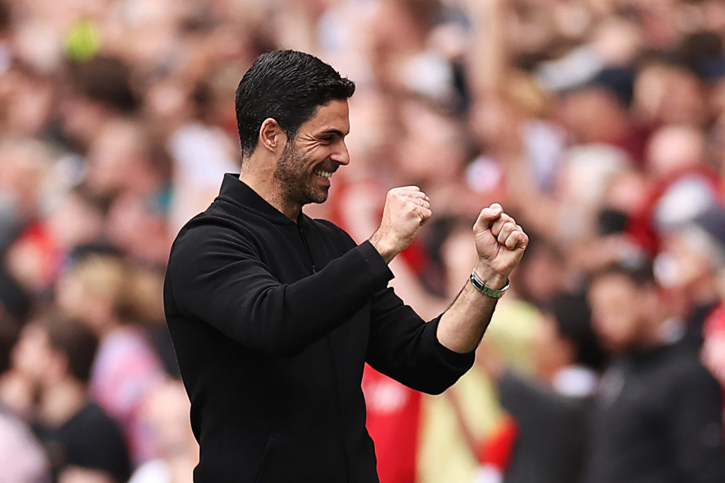 Mikel Arteta, Manager of Arsenal, celebrates his team's first goal scored by Bukayo Saka of Arsenal (not pictured) from a penalty kick during the P...