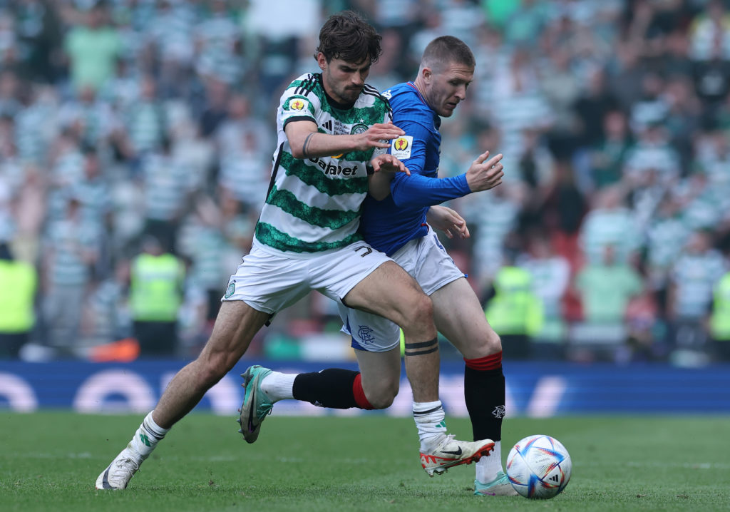 Matt O'Riley of Celtic vies with John Lundstram of Rangers during the Scottish Cup Final match between Celtic and Rangers at Hampden Park on May 25...