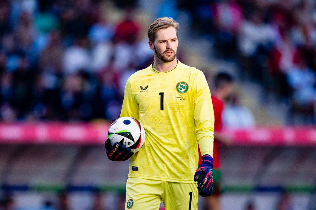 Goalkeeper Caoimhin Kelleher of Ireland picks up the ball during the International Friendly match between Portugal and the Republic of Ireland at E...