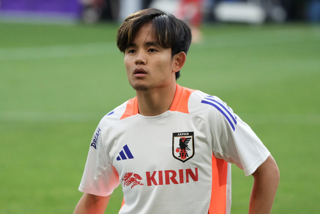 Takefusa Kubo of Japan warms up prior to the FIFA World Cup Asian second qualifier Group B match between Japan and Syria at Edion Peace Wing Hirosh...