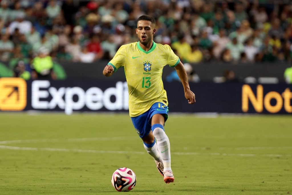 Yan Couto #13 of Brazil dribbles the ball in the first half against Mexico during the International Friendly at Kyle Field on June 08, 2024 in Coll...