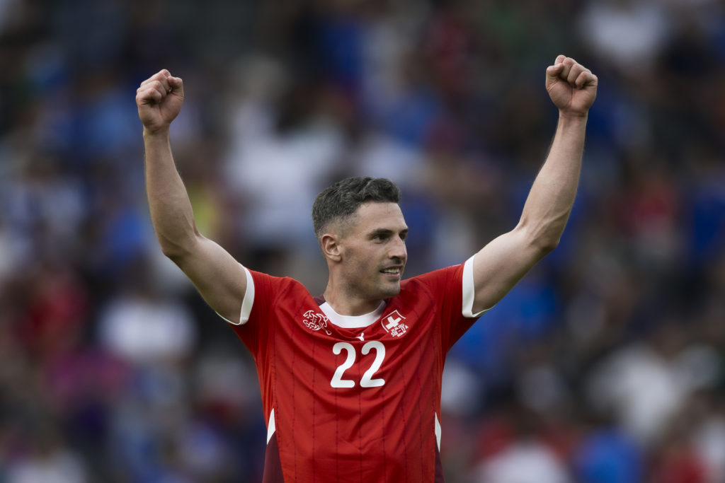 Fabian Schar of Switzerland celebrates at the end of the