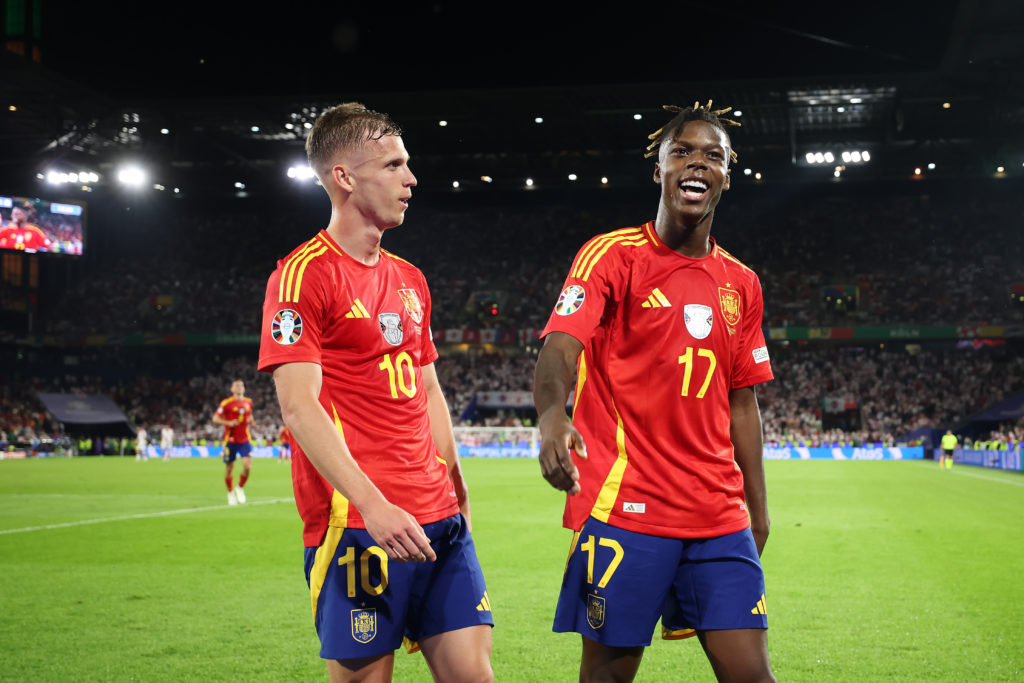 Nico Williams of Spain celebrates scoring his team's third goal with teammate Dani Olmo during the UEFA EURO 2024 round of 16 match between Spain a...