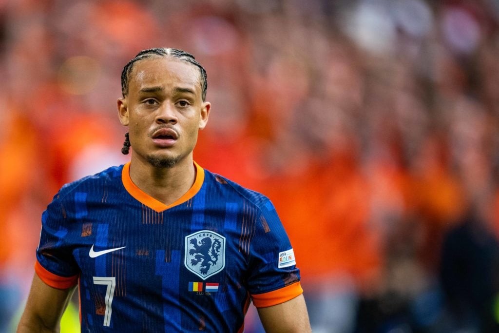 Xavi Simons of the Netherlands looks on during the UEFA EURO 2024 round of 16 match between Romania and Netherlands at Munich Football Arena on July 2, 2024