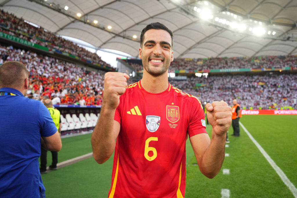 Mikel Merino of Spain celebrates his team's victory and qualification to the quarter-finals in the UEFA EURO 2024 quarter-final match between Spain and Spain.