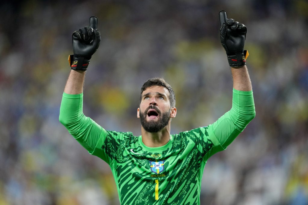 Alisson Becker GK #1 Brazil reacts to saving a PK during a Copa America 2024 quarterfinal match between Brazil and Uruguay at Allegiant Stadium on ...