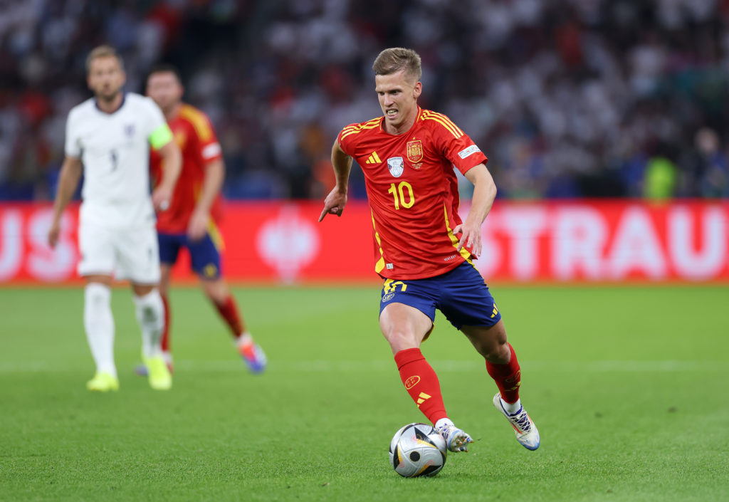 Dani Olmo of Spain runs with the ball during the UEFA EURO 2024 final match between Spain and England at Olympiastadion on July 14, 2024 in Berlin,...