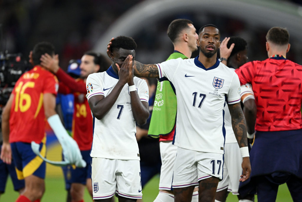 Ivan Toney of England embraces Bukayo Saka of England after defeat against Spain in the UEFA EURO 2024 final match between Spain and England at Oly...