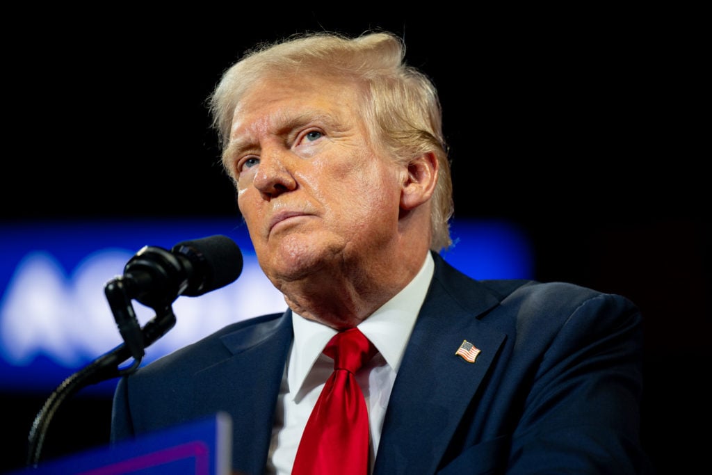 U.S. Republican Presidential nominee former President Donald Trump speaks to attendees during his campaign rally at the Bojangles Coliseum on July ...