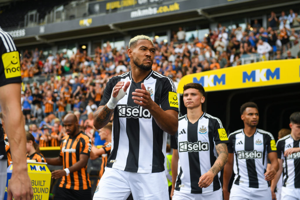 Joelinton of Newcastle United applauds travelling fans during the pre-season friendly between Hull City and Newcastle United at MKM Stadium on July...