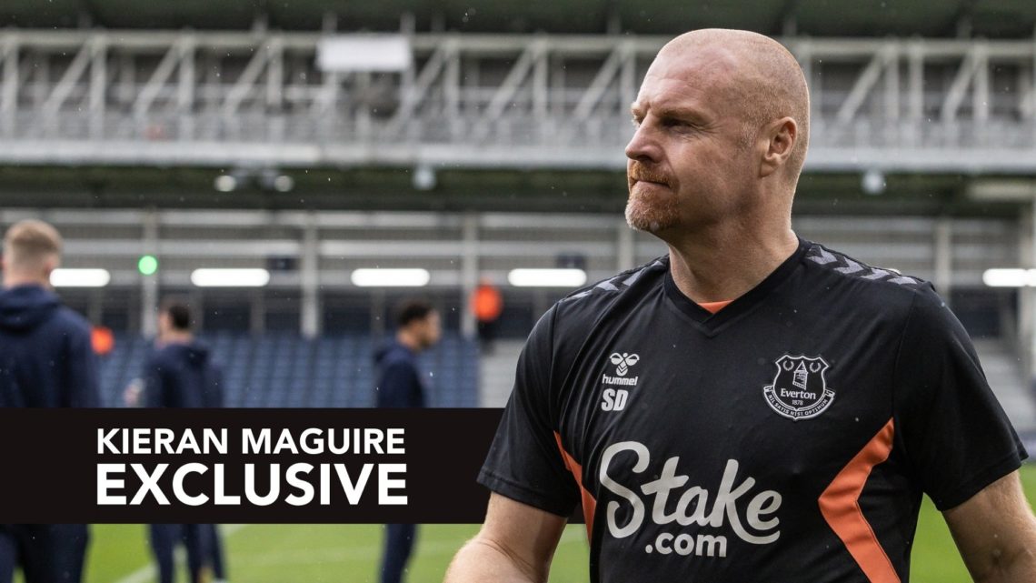 Everton's manager Sean Dyche inspecting the pitch.