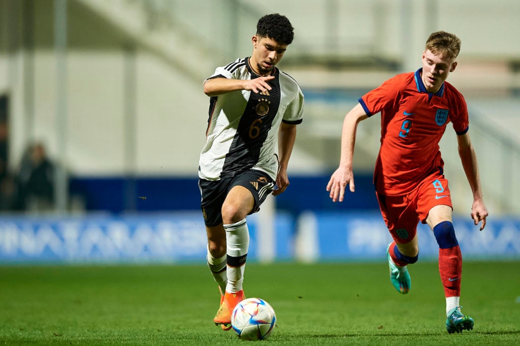 Fayssal Harchaoui of Germany U17 competes for the ball with Mason Cotcher of England U17 during the international friendly match between Germany U1...