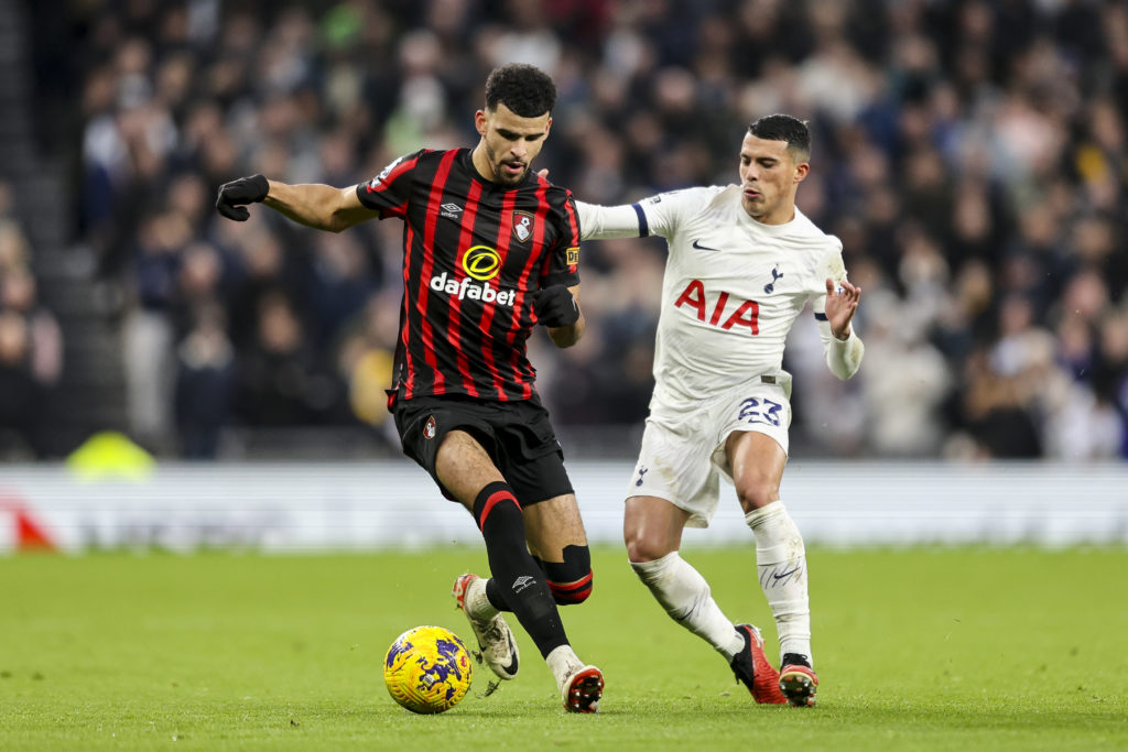 Dominic Solanke of Bournemouth holds off Pedro Porro of Tottenham Hotspur during the Premier League match between Tottenham Hotspur and AFC Bournem...