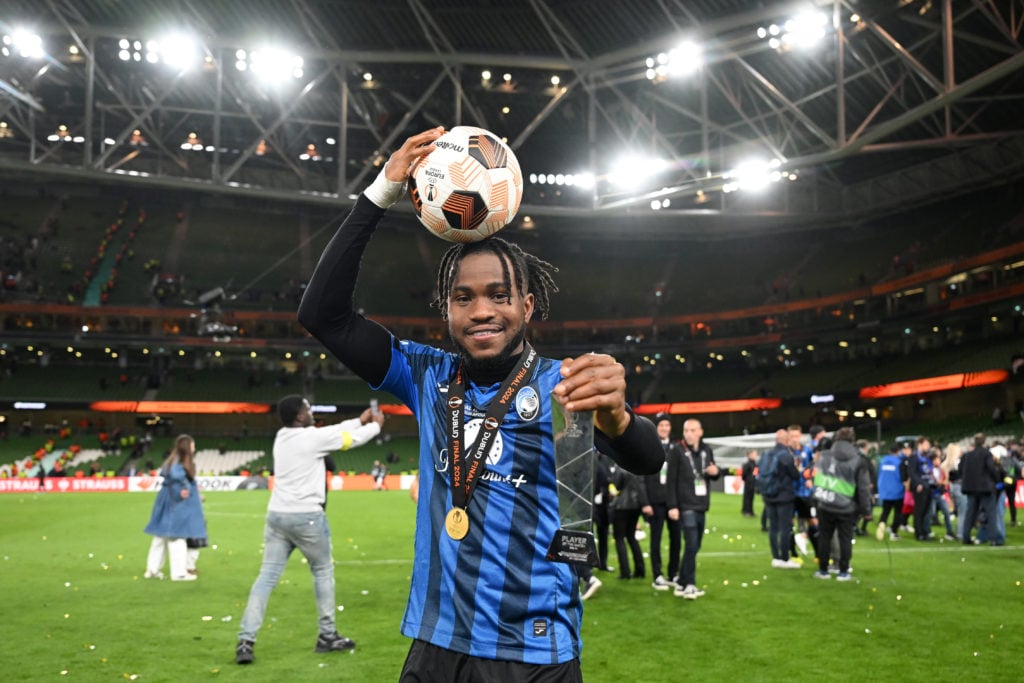 Ademola Lookman of Atalanta BC poses for a photograph whilst wearing his winners medal with the Match Ball after scoring a hat-trick and the Hankoo...