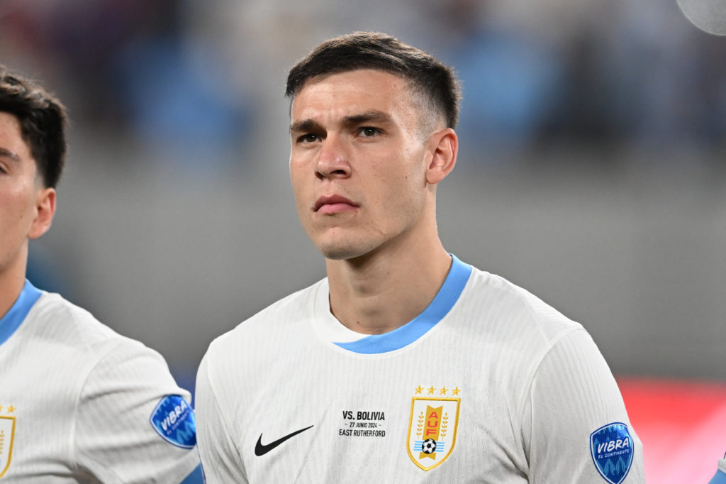 Manuel Ugarte #5 of Uruguay stands for the national anthem before a Copa America 2024 Group C match between Bolivia and Uruguay at MetLife Stadium ...