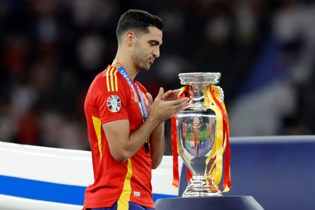 Mikel Merino of Spain celebrates the European Championship victory with the trophy  during the  EURO match between Spain  v England  at the Olympia...