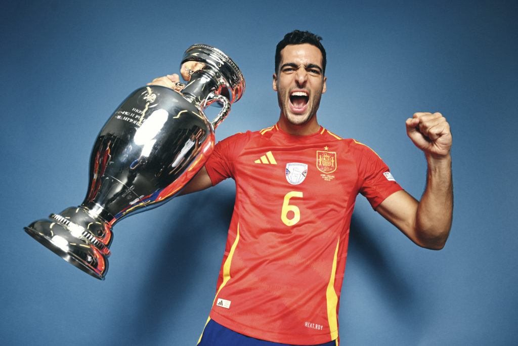 Mikel Merino of Spain poses for a photo with the UEFA Euro 2024 Henri Delaunay Trophy during the UEFA EURO 2024 final match between Spain and Engla...