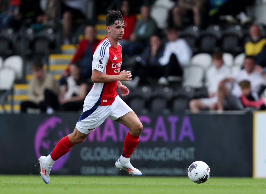 Charlie Patino of Arsenal XI runs with the ball during the Pre-Season Friendly match between Boreham Wood and Arsenal XI at Meadow Park on July 13,...