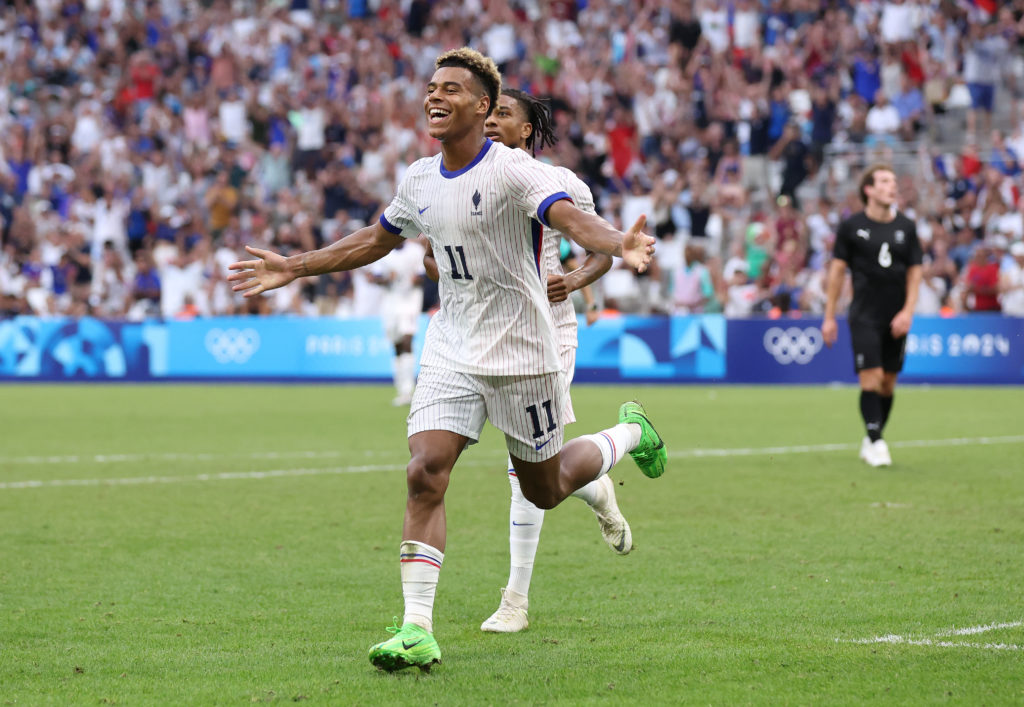 Desire Doue #11 of Team France celebrates scoring his team's second goal during the Men's group A match between New Zealand and France during the O...