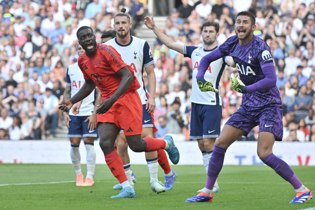 Dayot Upamecano of Bayern Munich celebrates after scoring as Guglielmo Vicario of Tottenham Hotspur reacts during the pre-season friendly match bet...