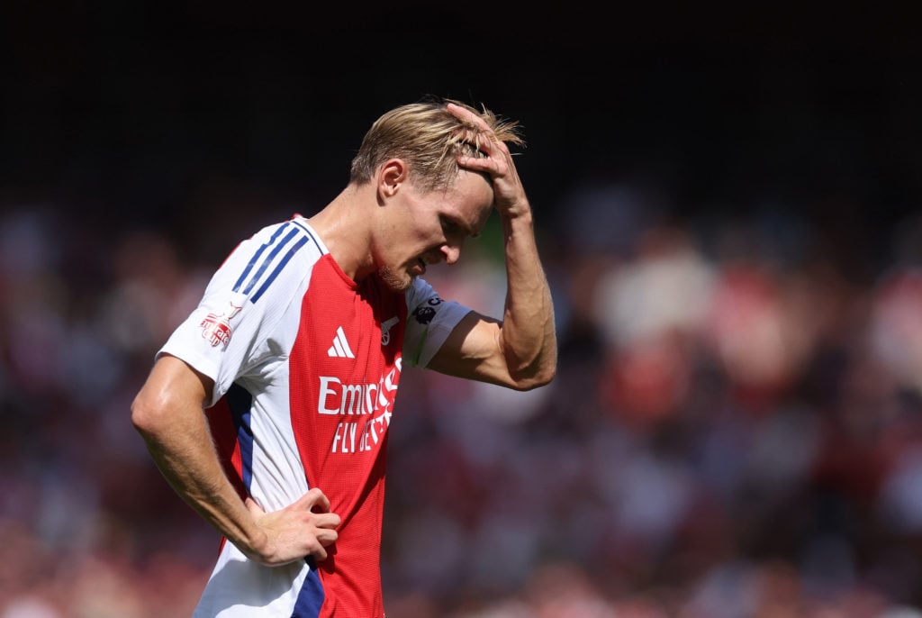 Martin Odegaard of Arsenal reacts during the pre-season friendly match between Arsenal and Olympique Lyonnais at Emirates Stadium on August 11, 202...