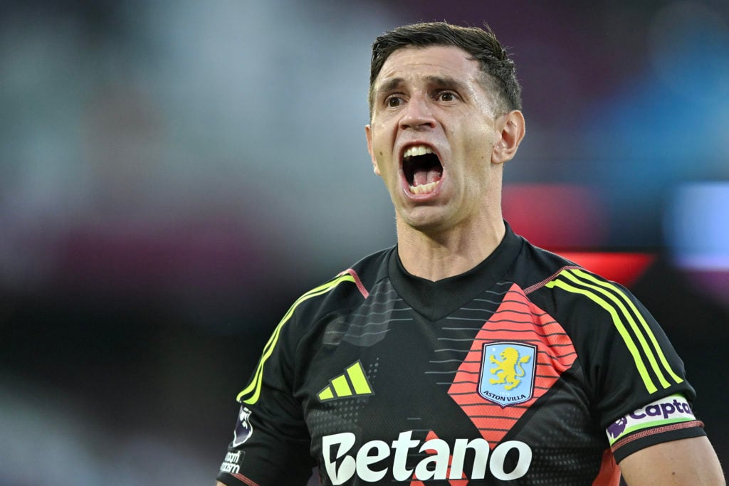 Emiliano Martinez of Aston Villa reacts during the Premier League match between West Ham United FC and Aston Villa FC at London Stadium on August 1...