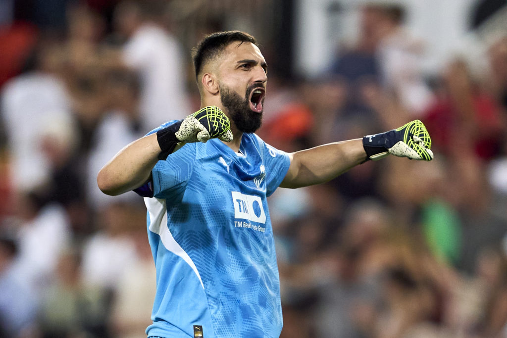 Giorgi Mamardashvili of Valencia CF celebrates after the first goal of his team scored by Hugo Duro of Valencia CF (not in frame) during the La Lig...