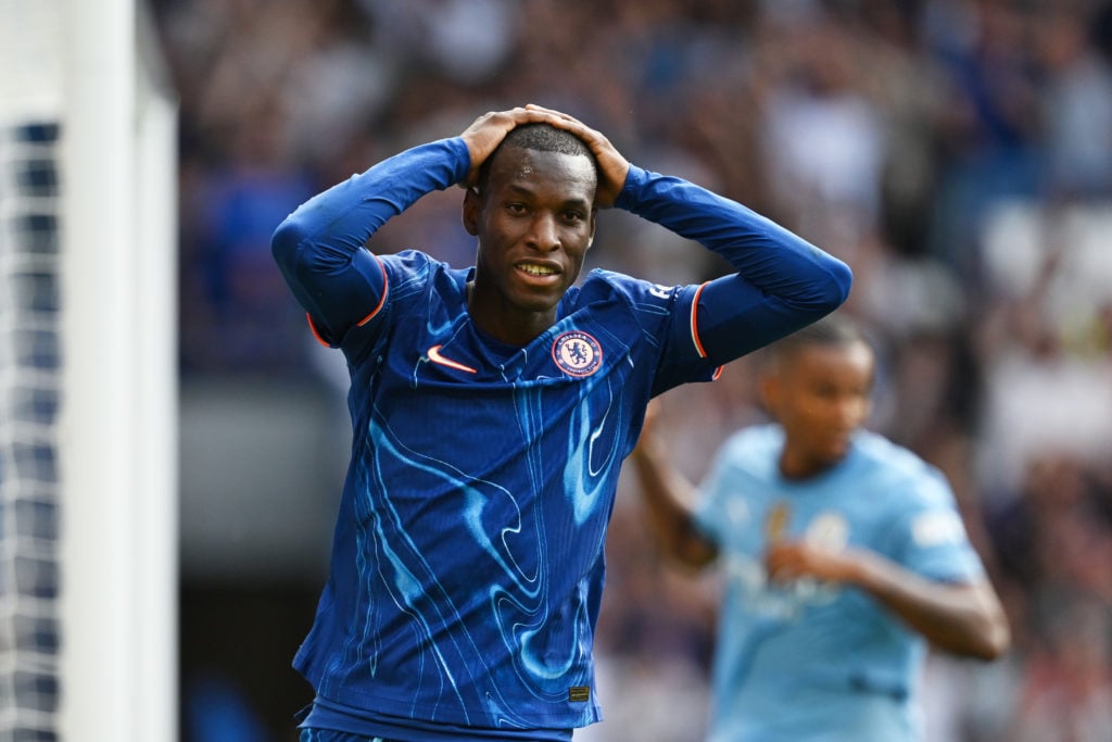 Nicolas Jackson of Chelsea reacts after he scores a goal which was later ruled out for offside during the Premier League match between Chelsea FC a...