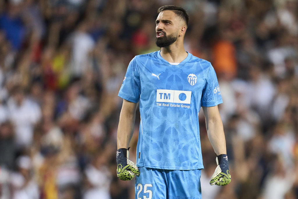 Giorgi Mamardashvili of Valencia CF celebrates after teammate Hugo Duro (not pictured) scores his team's first goal during the La Liga match betwee...