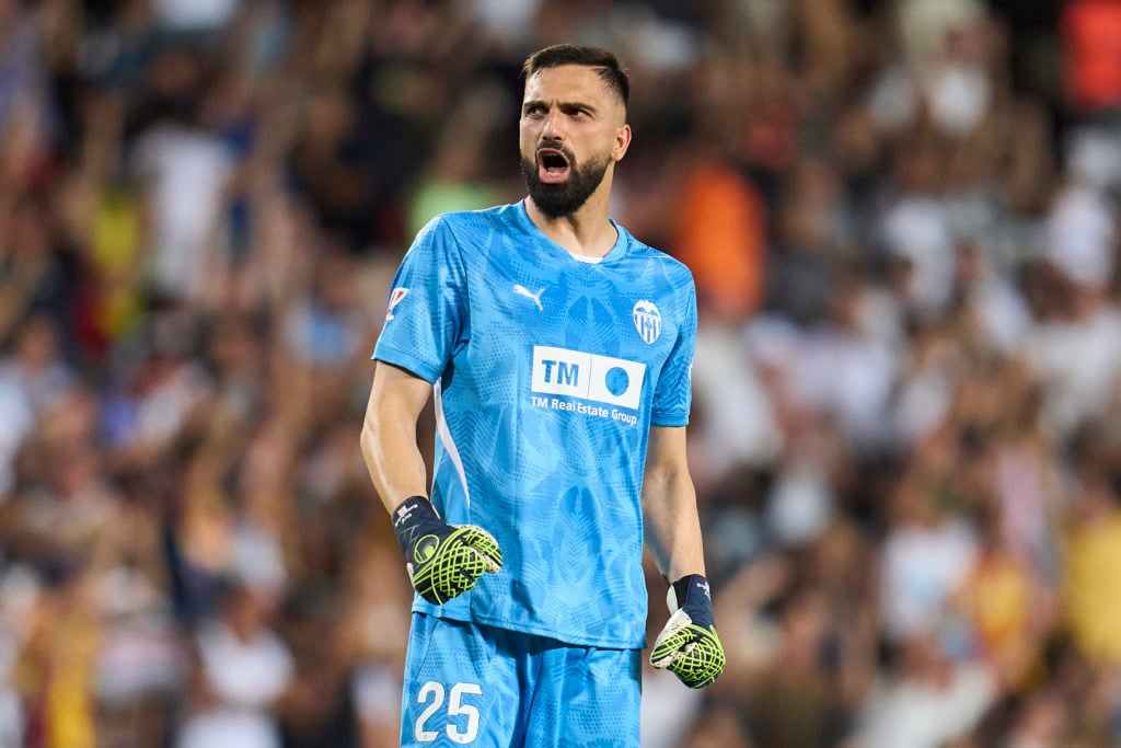 Giorgi Mamardashvili of Valencia CF celebrates after teammate Hugo Duro (not pictured) scores his team's first goal during the La Liga match betwee...