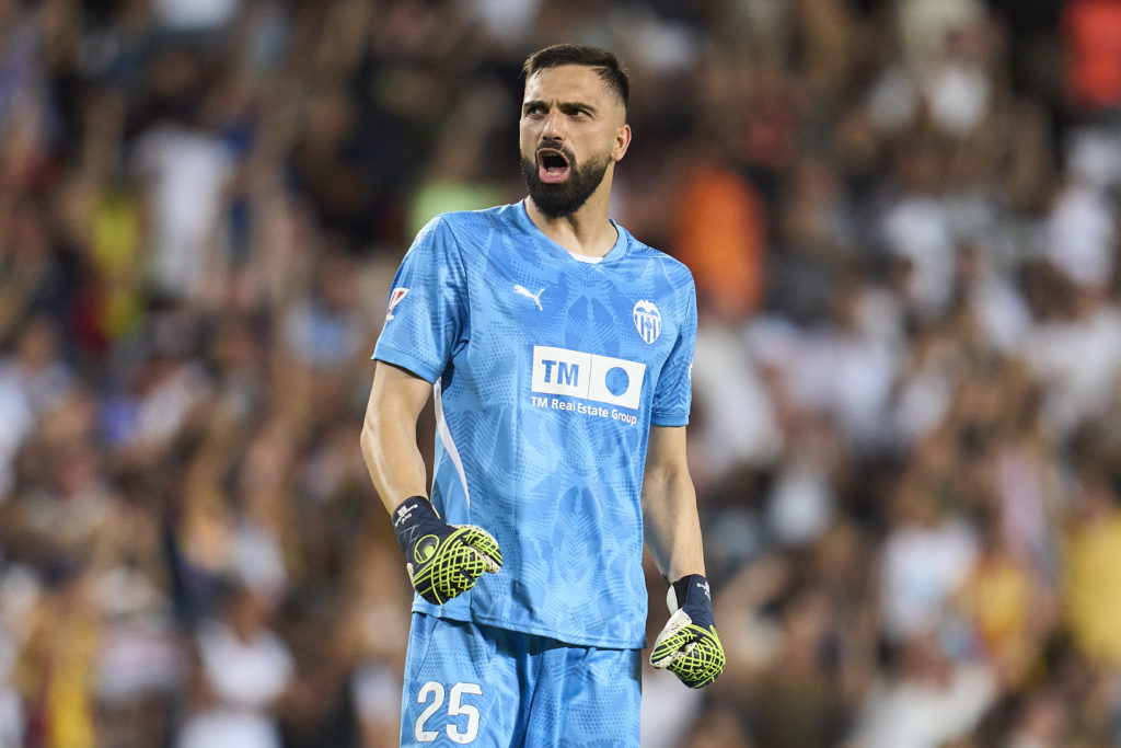 Giorgi Mamardashvili of Valencia CF celebrates after teammate Hugo Duro (not pictured) scores his team's first goal during the La Liga match betwee...