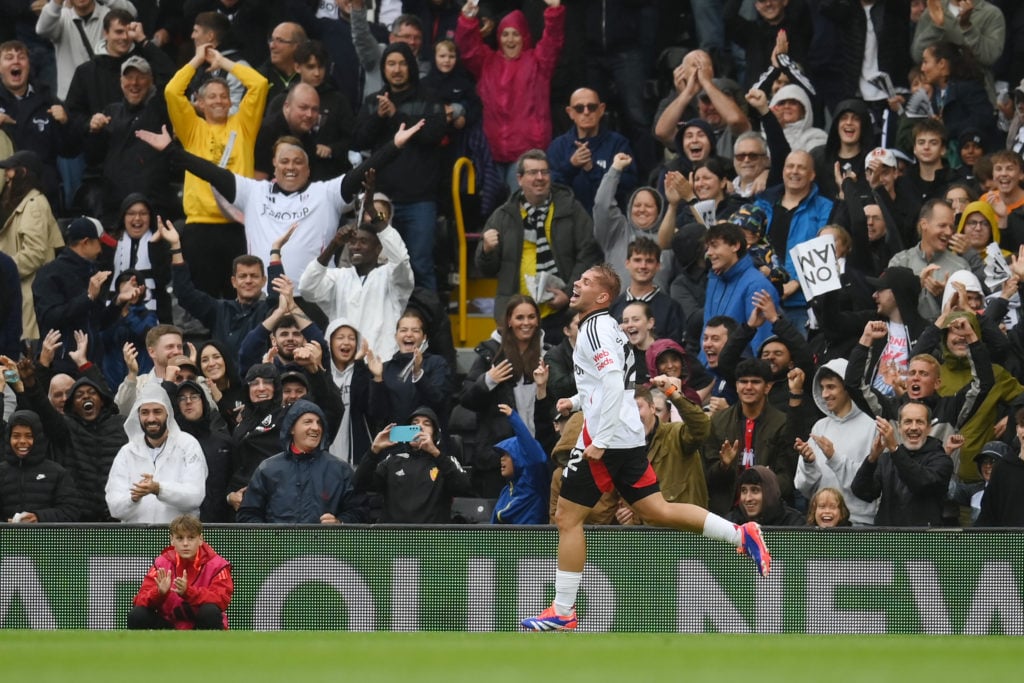 Emile Smith Rowe of Fulham celebrates scoring his team's first goal during the Premier League match between Fulham FC and Leicester City FC at Crav...