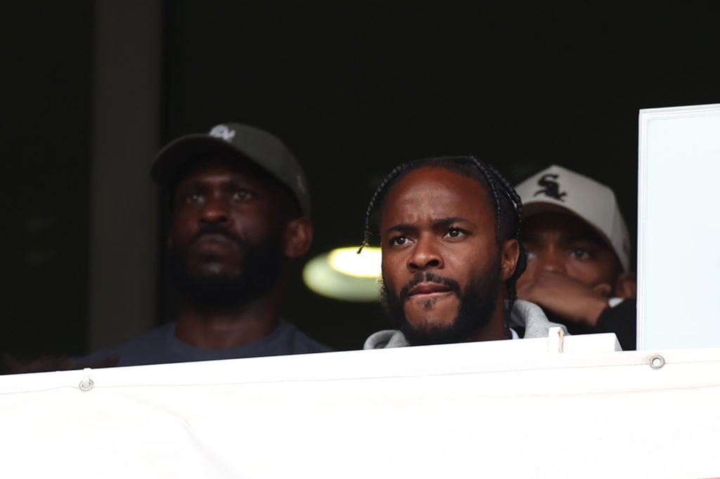 Raheem Sterling of Arsenal looks on from the stands during the Premier League match between Arsenal FC and Brighton & Hove Albion FC at Emirate...