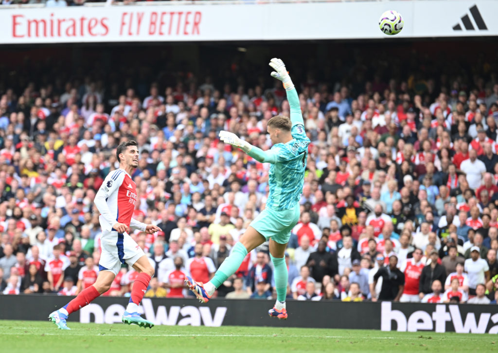 Kai Havertz chips the ball over Brighton goalkeeper Bart Verbruggen to score the Arsenal goal during the Premier League match between Arsenal FC an...