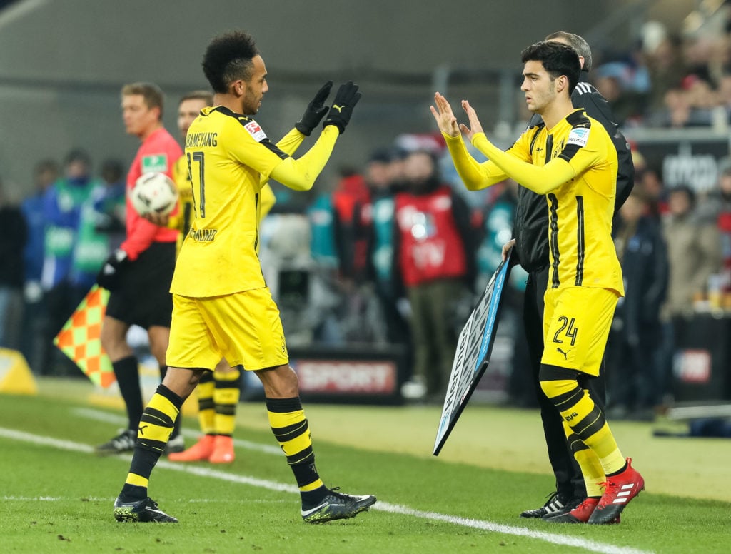 Pierre-Emerick Aubameyang of Dortmund shakes hands with Mikel Merino of Dortmund during the Bundesliga match between TSG 1899 Hoffenheim and Boruss...