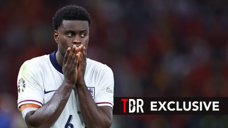 A dejected Marc Guehi of England during the UEFA EURO 2024 final match between Spain and England. Overlaid, an exclusive banner.