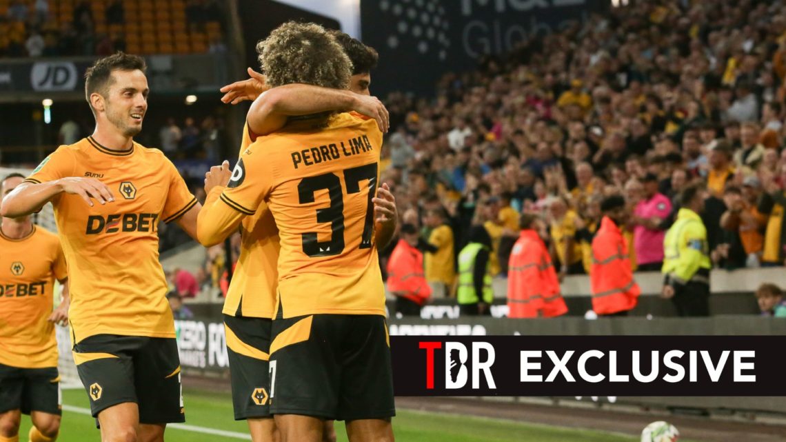 Goncalo Guedes of Wolves celebrates with his teammates after scoring their first goal during the Carabao Cup 2nd Round match. Overlaid, an exclusiv...