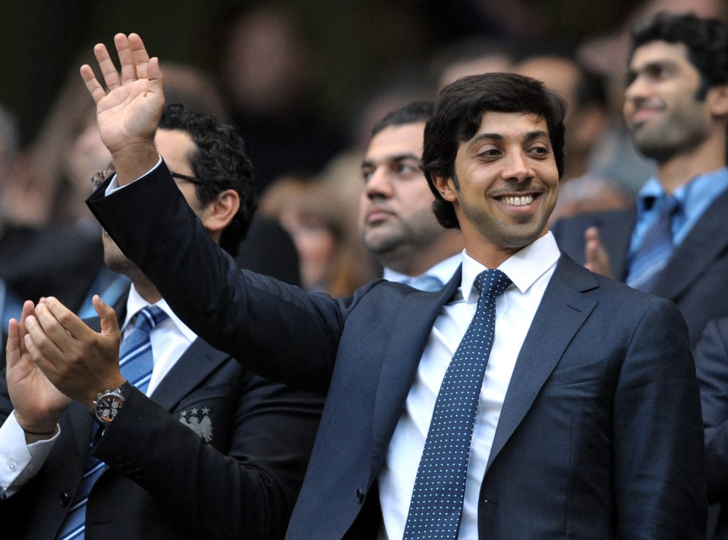 Manchester city owner Sheikh Mansour bin Zayed Al Nahyan (C) looks on during the English Premier League football match against Liverpool at The Cit...