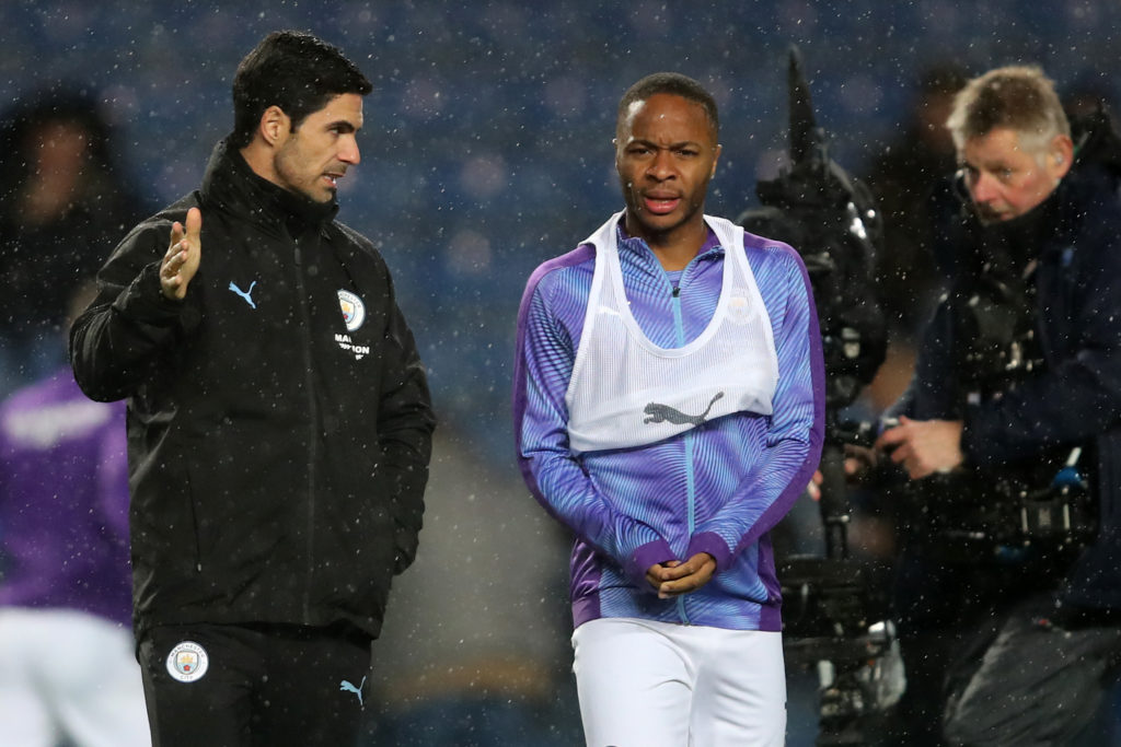 Mikel Arteta assistant coach of Manchester City speaks to Raheem Sterling during the Carabao Cup Quarter Final match between Oxford United and Manc...