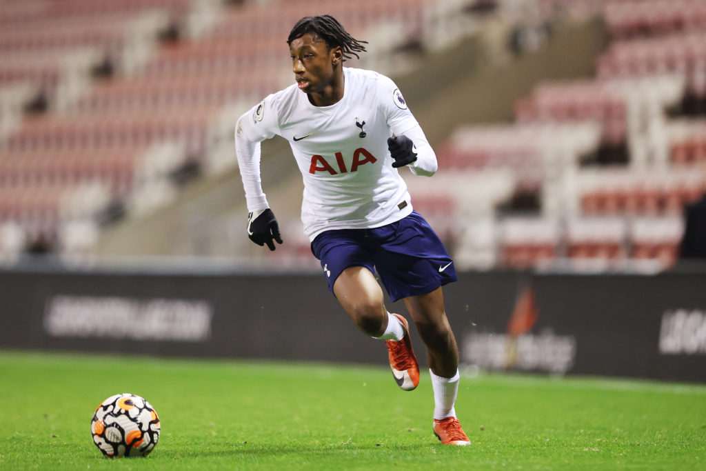 Romaine Mundle of Tottenham Hotspur runs with the ball during the Premier League 2 match between Manchester United U23 and Tottenham Hotspur U23 at...