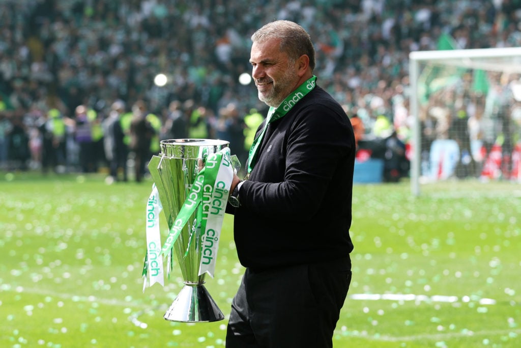 Angelos Postecoglou, Manager of Celtic lifts The Cinch Premiership trophy after their sides victory during the Cinch Scottish Premiership match bet...