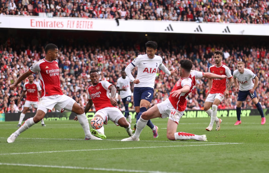 Son Heung-Min of Tottenham Hotspur scores his sides first goal during the Premier League match between Arsenal FC and Tottenham Hotspur at Emirates...