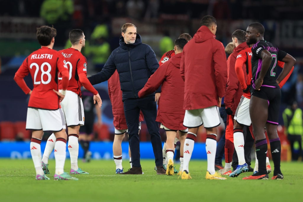 Bayern Munich coach Thomas Tuchel shakes hands with Manchester United players during the UEFA Champions League match between Manchester United and ...