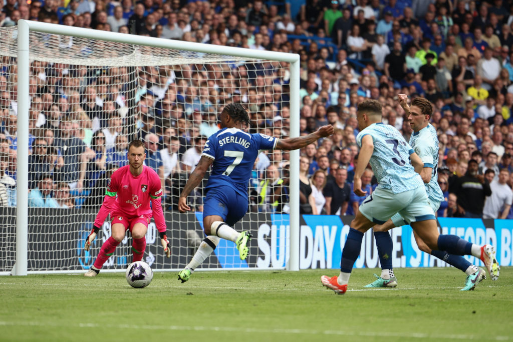 Chelsea's English midfielder #07 Raheem Sterling (2-L) shoots to score past Bournemouth's Brazilian goalkeeper #01 Neto (L) during the English Prem...