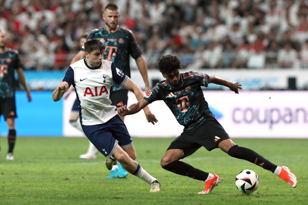 Adam Aznou of Bayern Muenchen (R) controls the ball under pressure of Mikey Moore of Tottenham Hotspur (L) during the pre-season friendly between Tottenham Hotspur and Bayern Muenchen at Seoul World Cup Stadium on August 03, 2024