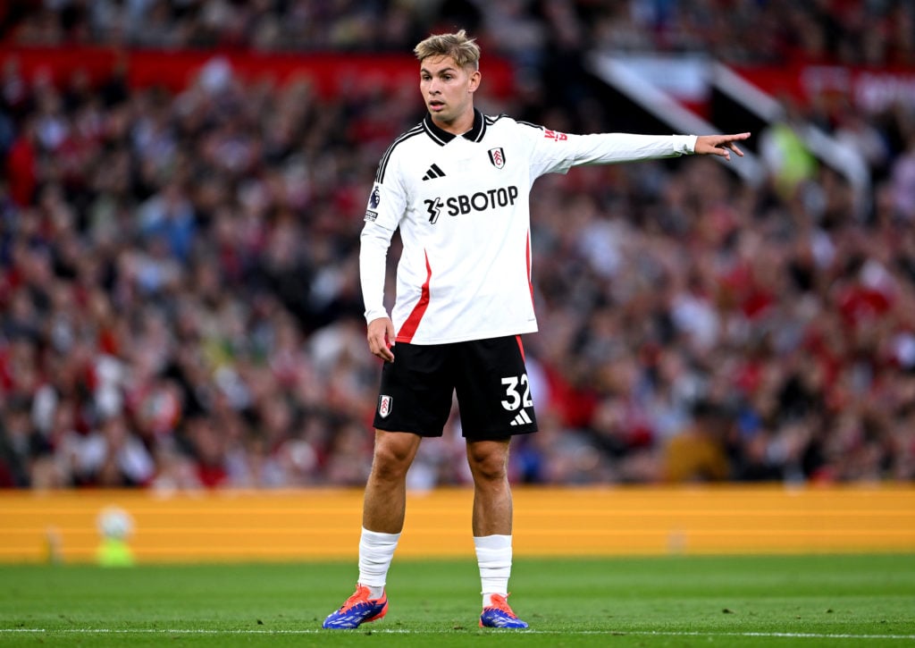 Emile Smith Rowe of Fulham gestures on the pitch during the Premier League match between Manchester United FC and Fulham FC at Old Trafford on Augu...