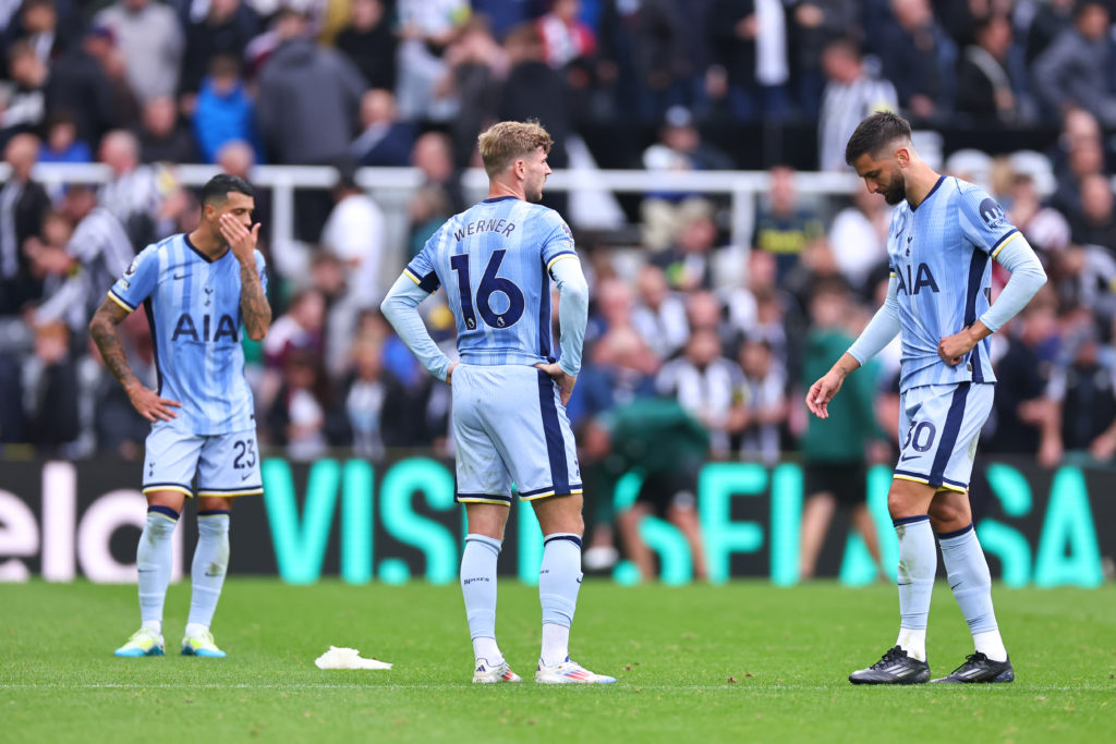 A dejected Rodrigo Bentacur of Tottenham Hotspur with team mates at full time during the Premier League match between Newcastle United FC and Totte...