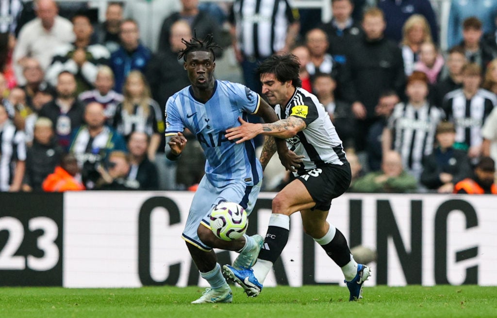 Newcastle United's Sandro Tonali battles with Tottenham Hotspur's Yves Bissouma during the Premier League match between Newcastle United and Totten...