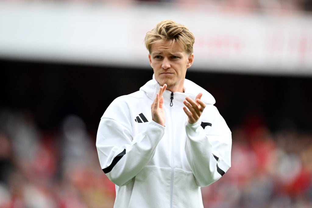 Martin Odegaard of Arsenal applauds the fans following the Premier League match between Arsenal FC and Brighton & Hove Albion FC at Emirates St...