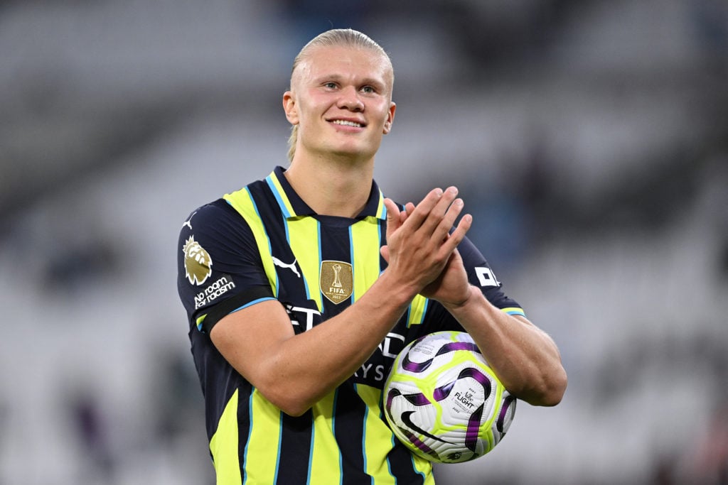 Erling Haaland of Manchester City celebrates with the match ball after scoring a hat-trick during the Premier League match between West Ham United ...